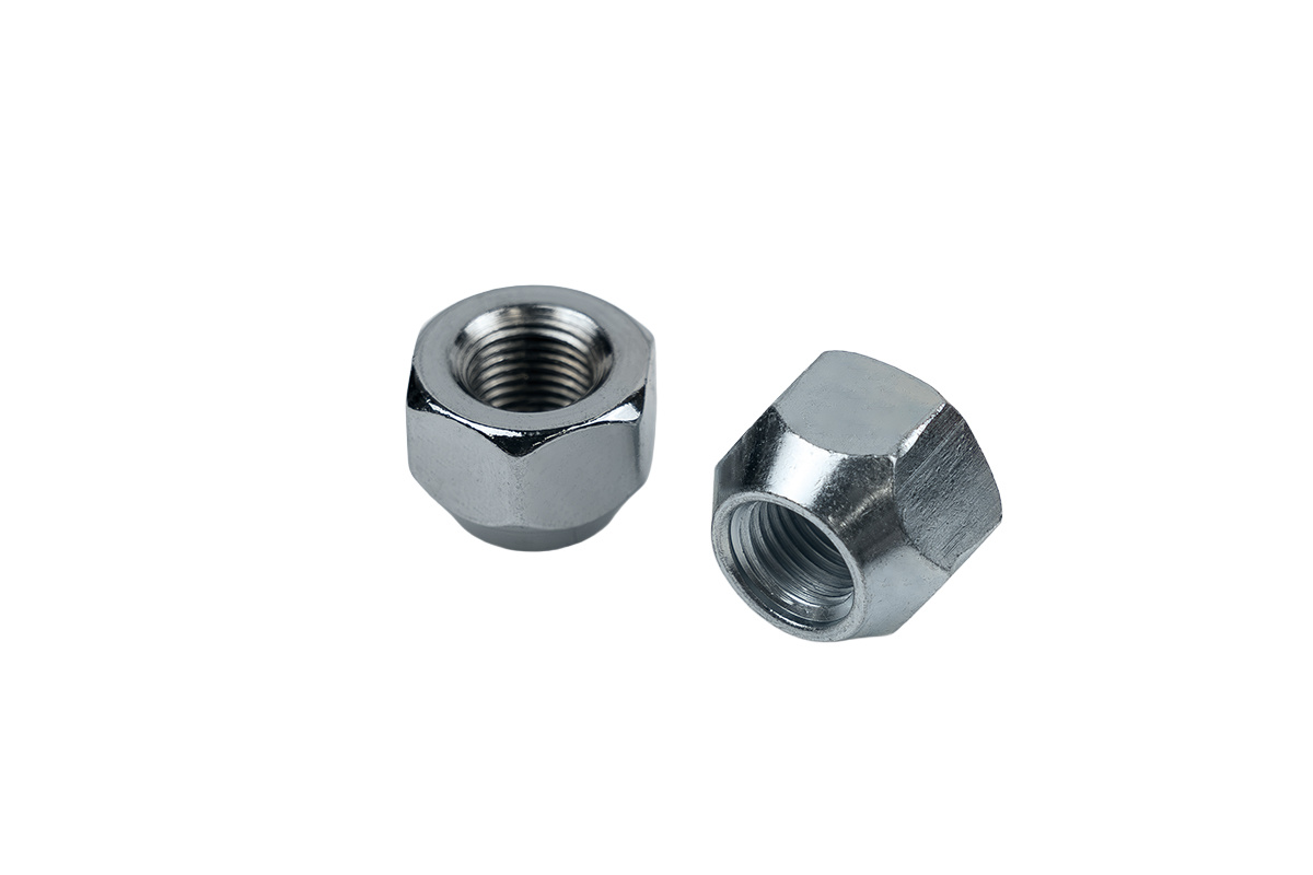 Nakrętki Stal M12x1,25 Stożek kl.21 przelotowa