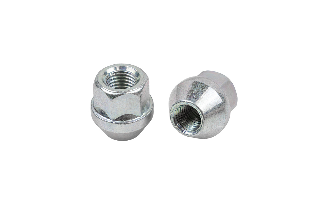 Nakrętki Stal M12x1,5 21mm Stożek kl.19 przelotowa